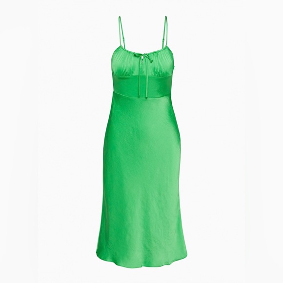 wilfred bellow midi dress SOLD) Aritzia Wilfred brand Bellow floral lavender midi dress. From their website: This is a slip-style midi dress with a ruched bodice, smocked back and a tie detail. It's cut from ReCrepe,